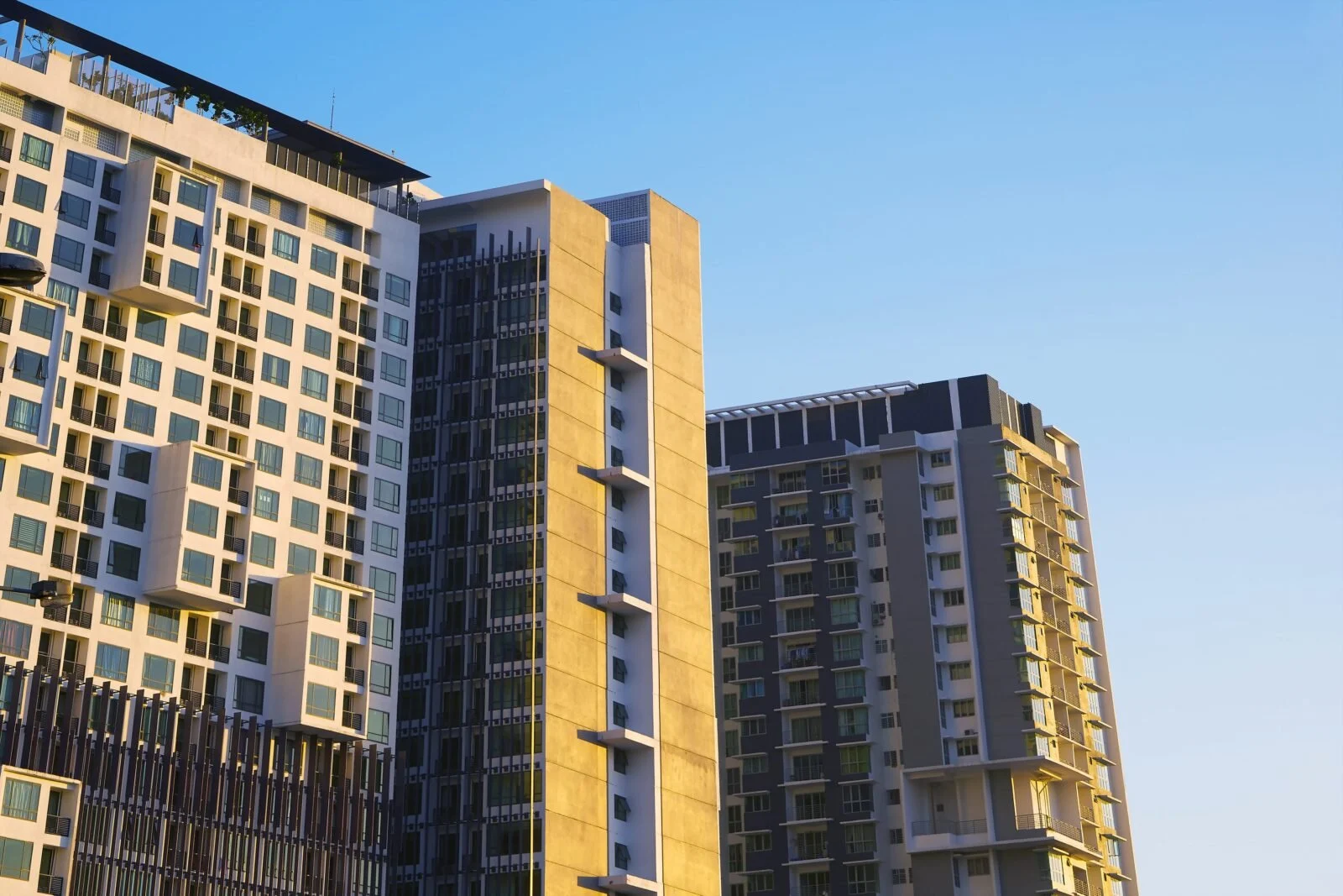 Residential condominium towers in late afternoon sun